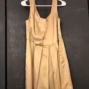 Gold, silk pleated dress
